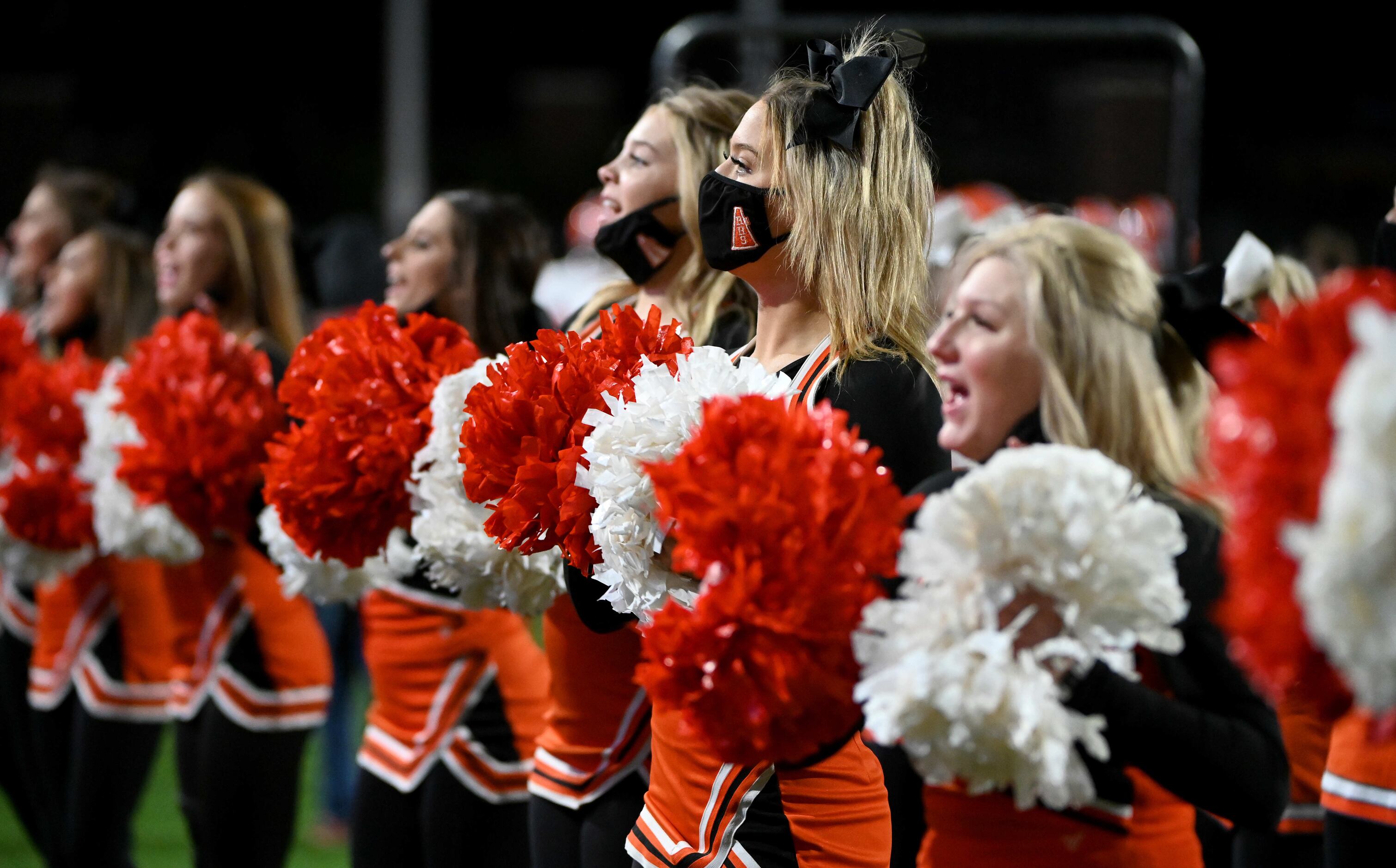 Rockwall cheerleaders perform in the first half of a Class 6A Division I area-round playoff...