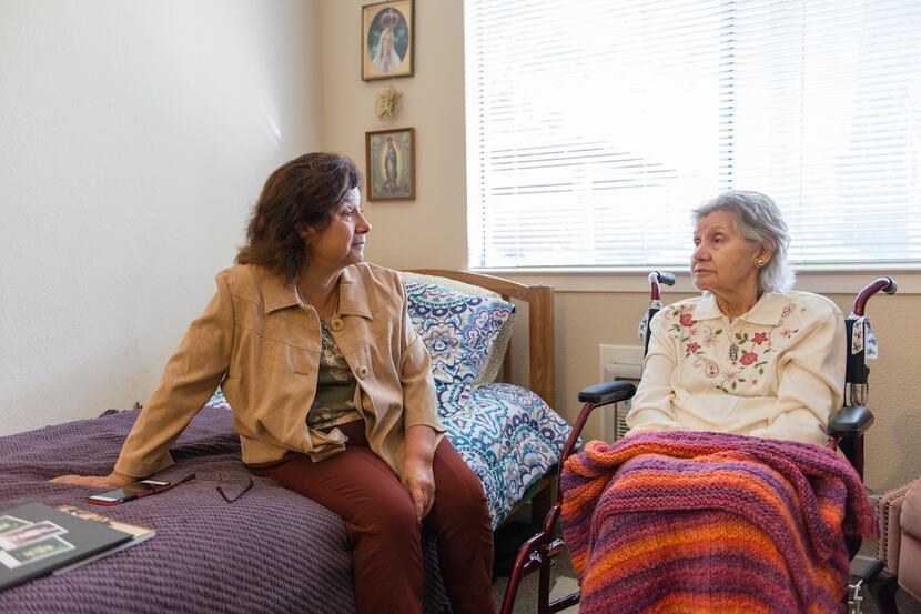Barbara Marquez visits her mother Florence Marquez at her nursing home, Sagebrook Senior...