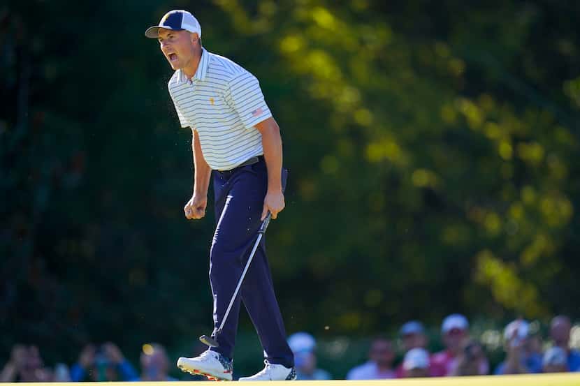 Jordan Spieth reacts aftering winning the hole during their fourball match at the Presidents...