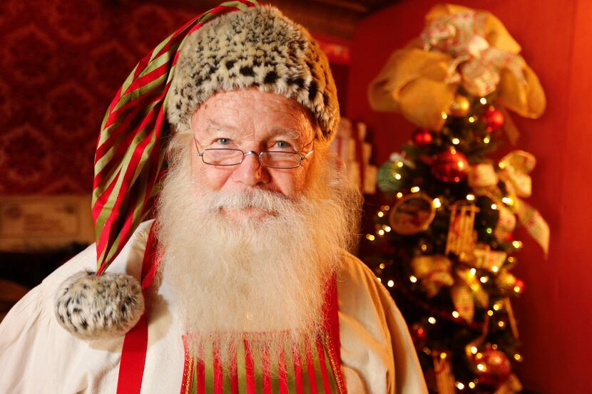 Santa Claus poses for a photo at Santa's Outpost Tuesday, November, 14, 2017 and will be...