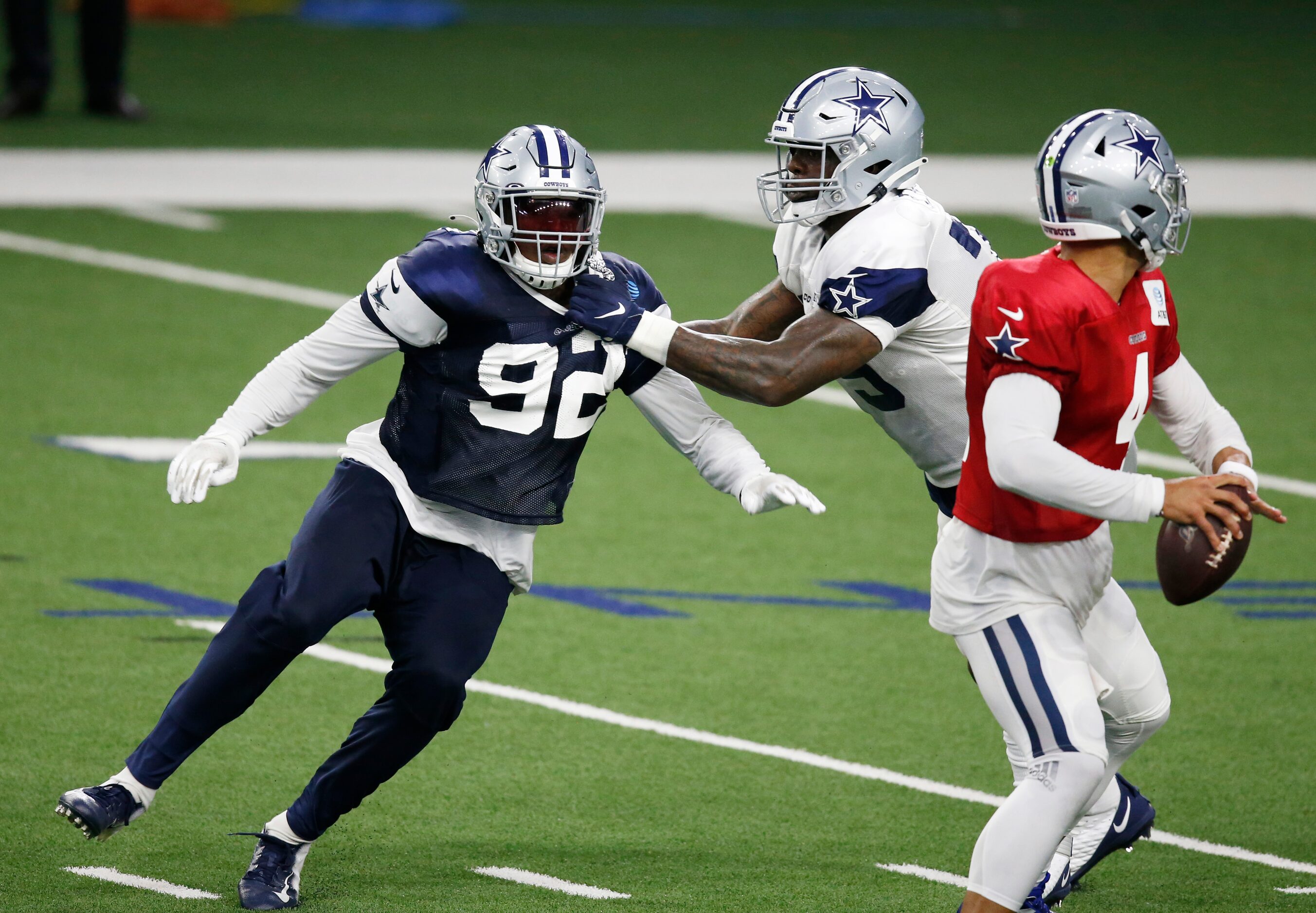 Dallas Cowboys defensive end Dorance Armstrong (92) is blocked by Dallas Cowboys offensive...