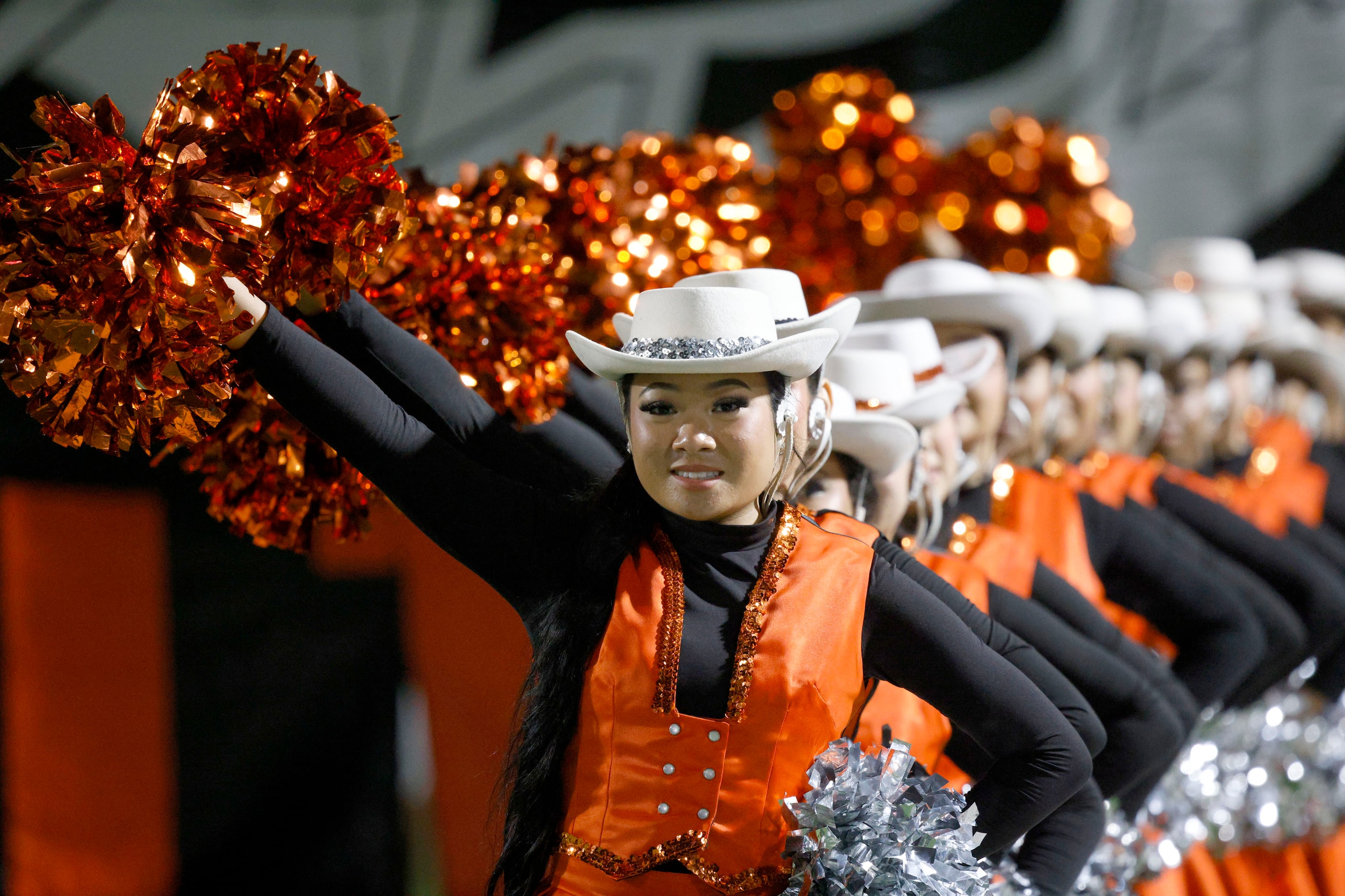 Haltom Highsteppers line up before a high school football game against Sam Houston at...