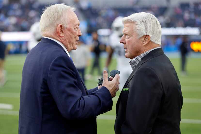 Dallas Cowboys owner Jerry Jones (left) visits with his former Pro Football Hall of Fame...