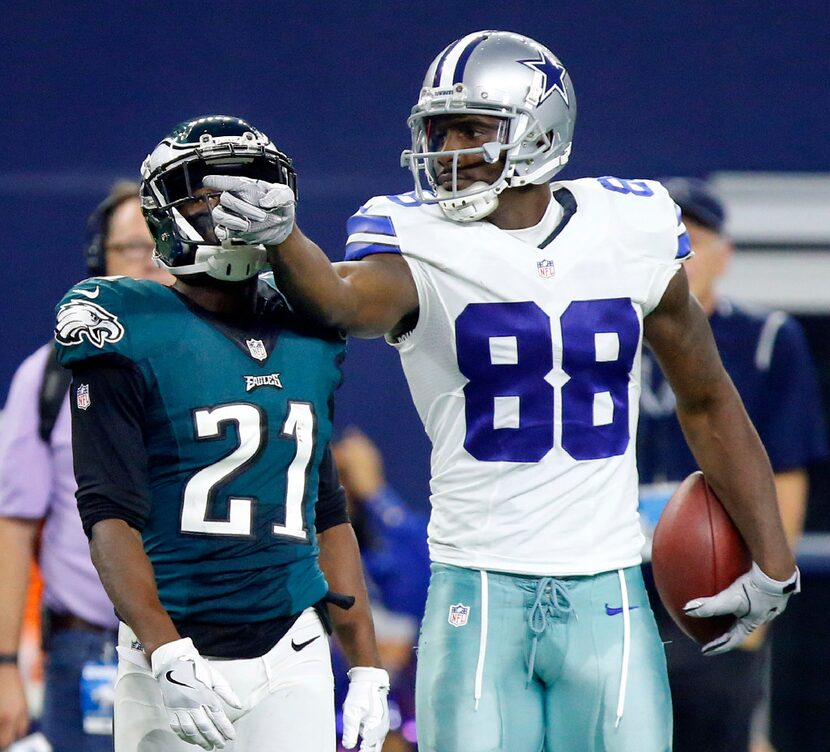 Dallas Cowboys wide receiver Dez Bryant (88) signals first down on a big catch as...