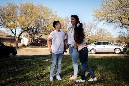 Aydin Franco, 9, with his family, mother Shani Leon and sister Layla Franco, 7, outside...