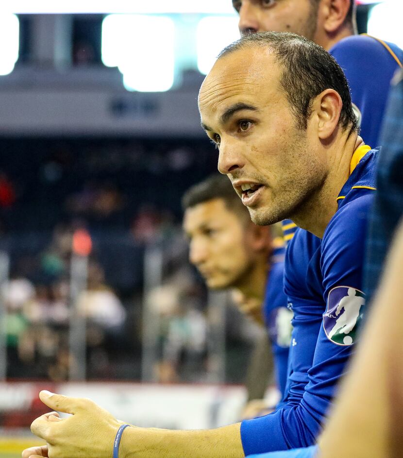Landon Donovan watches from the bench as his team the San Diego Sockers take on the Dallas...