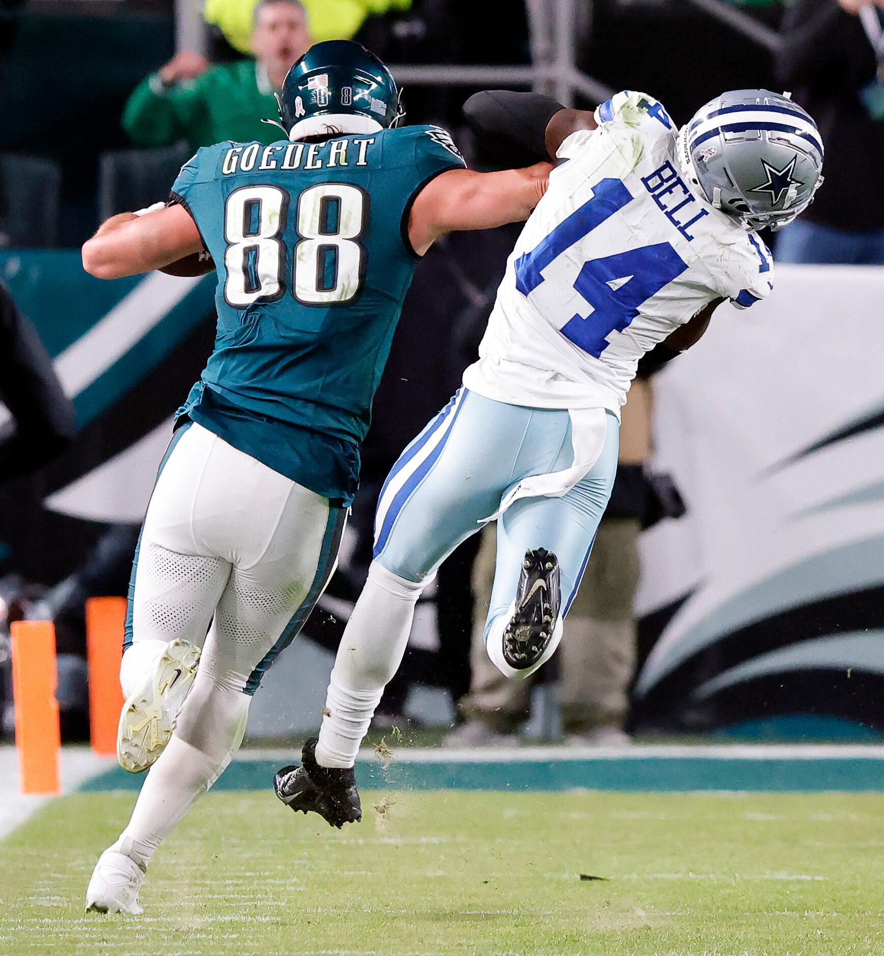 Philadelphia Eagles tight end Dallas Goedert (88) stick arms Dallas Cowboys safety Markquese...