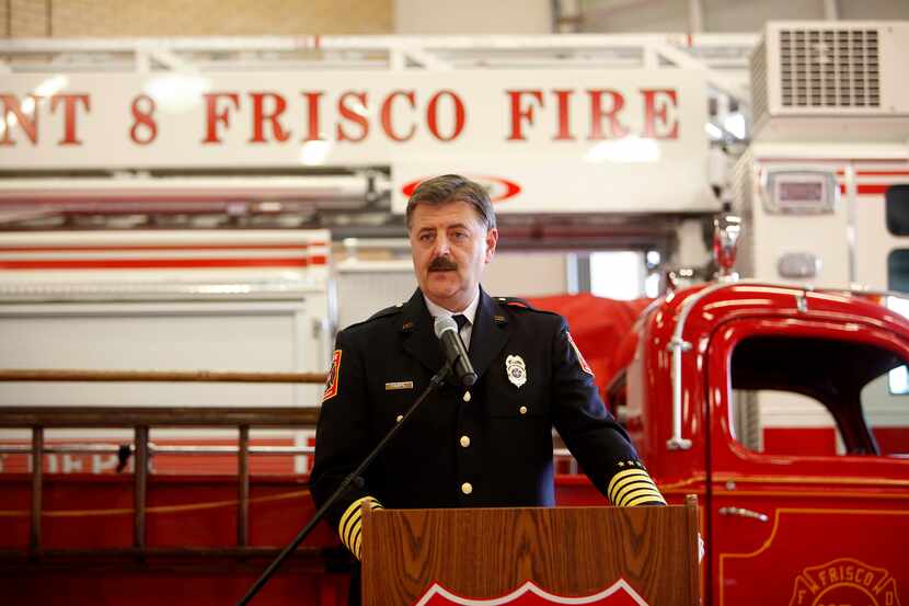 Frisco Fire Chief Mark Piland speaks during celebrations to mark the Frisco Fire...