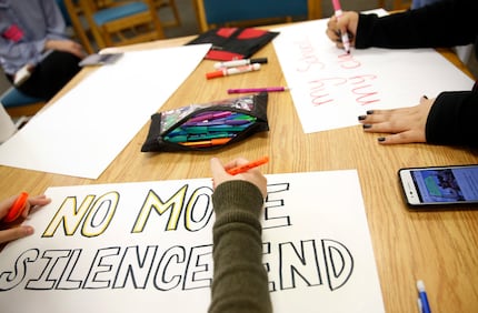 Students made signs for the March for Our Lives rally at Irving High School on Tuesday. In...