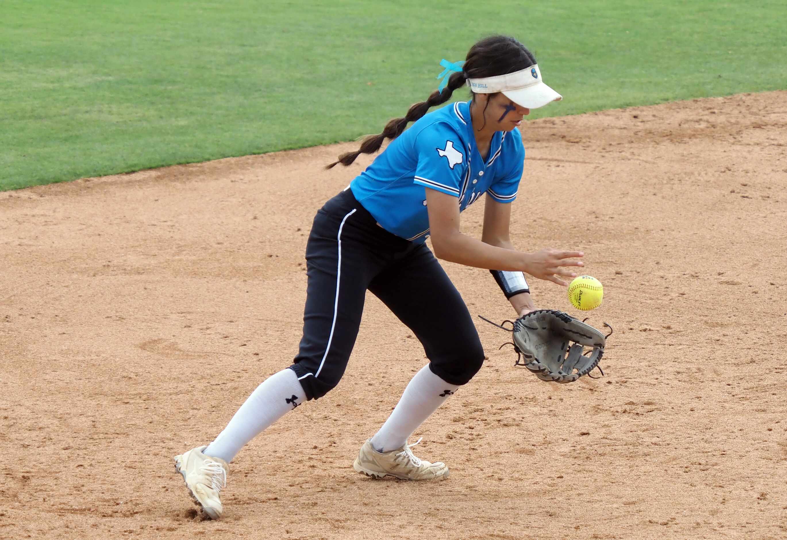 Prosper Rock Hill short stop Camila Springs collects a short grounder against Montgomery...