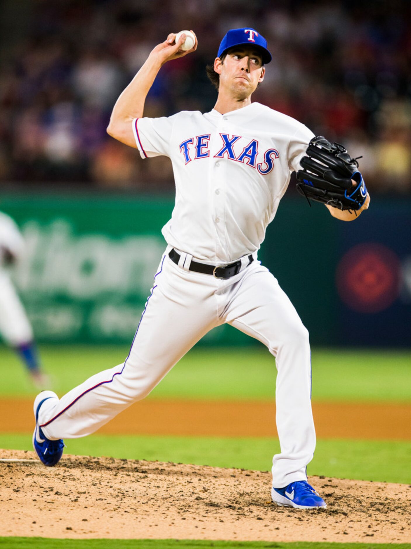 Texas Rangers relief pitcher Luke Farrell (60) pitches during the fourth inning of an MLB...