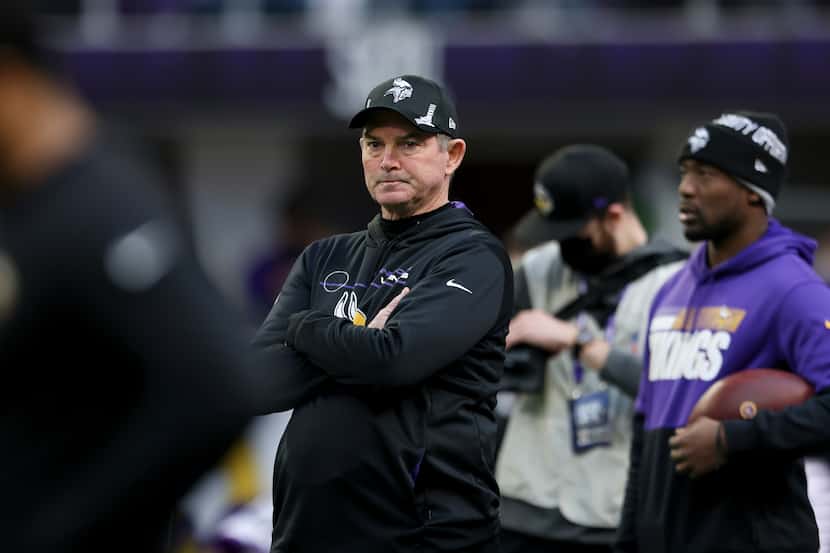 Minnesota Vikings head coach Mike Zimmer on the field prior to an NFL football game against...