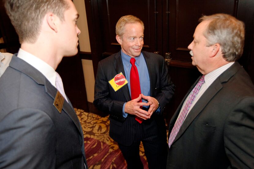 Phillip Huffines (center) vowed to remain neutral in primary races. 