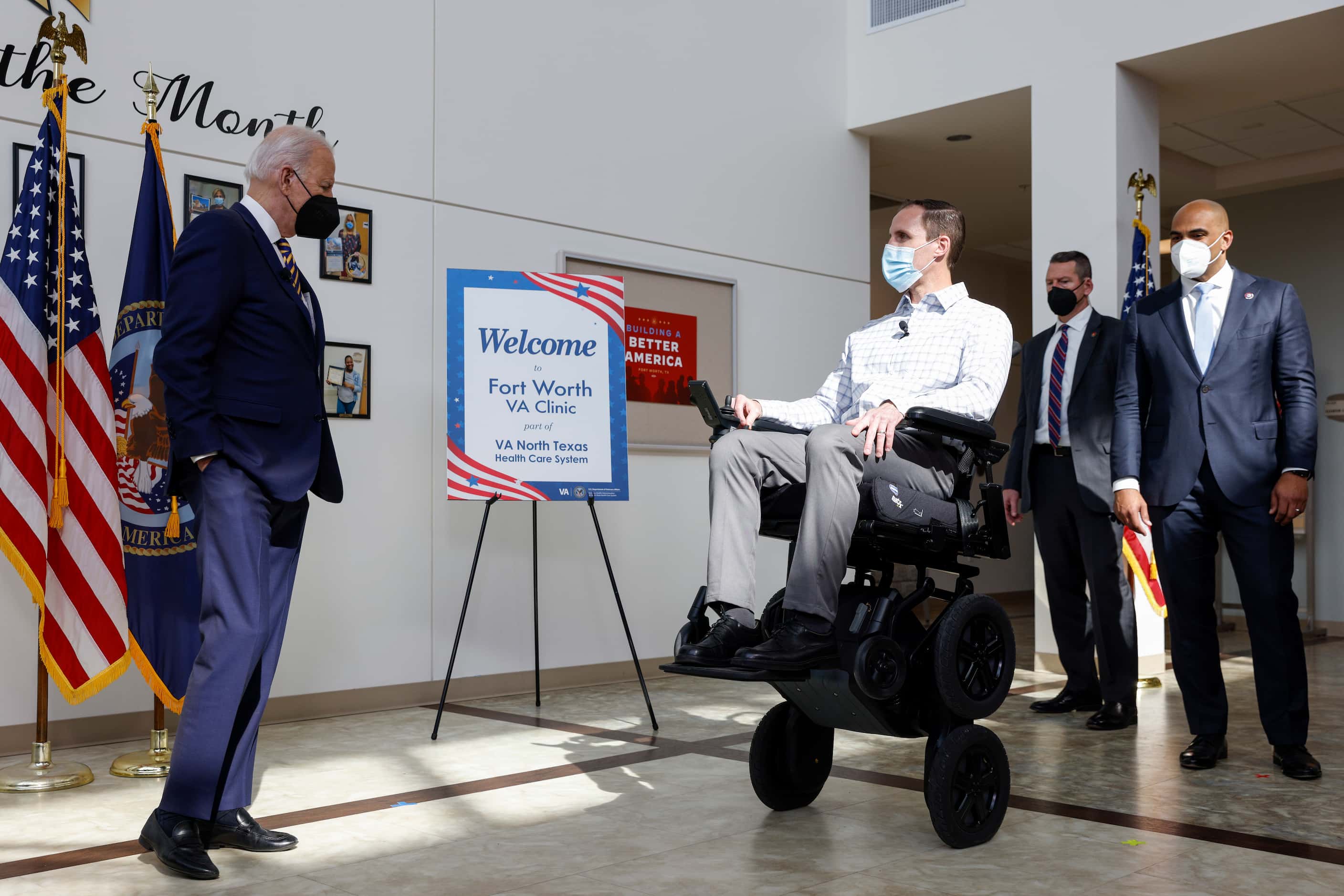 President Joe Biden watches as Joshua Geering, spinal cord injury lead physical therapist at...