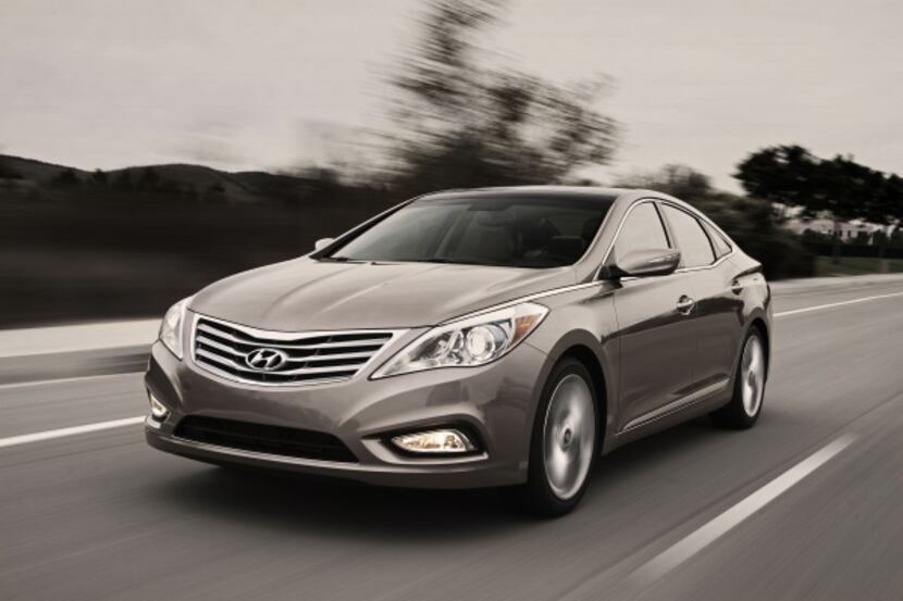 The Hyundai Azera has thrown off its old frumpy persona; it's now got a look that demands,...