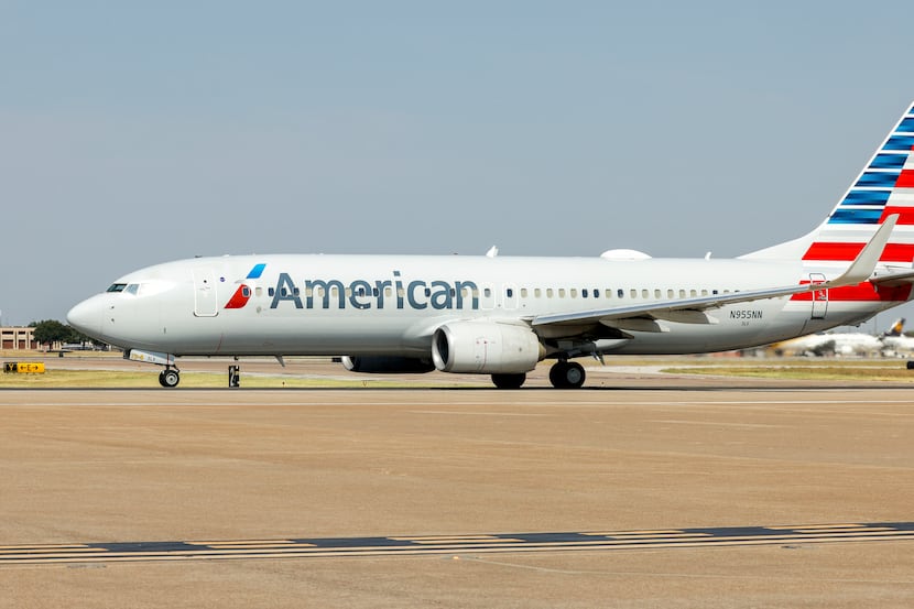 An American Airlines Boeing 737-823 taxis to a gate at DFW International Airport, Tuesday,...