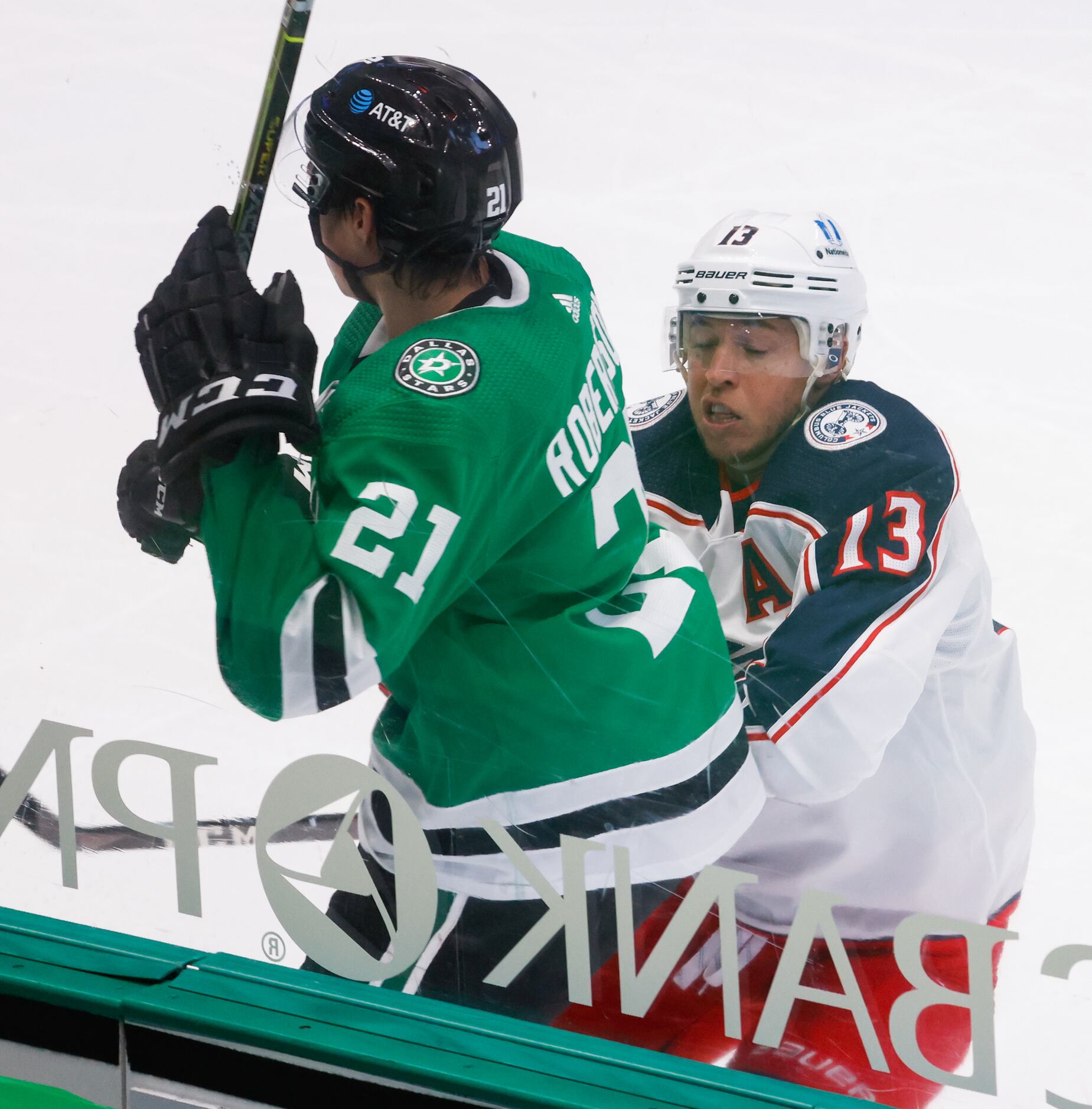 Dallas Stars left wing Jason Robertson (21) and Columbus Blue Jackets right wing Cam...
