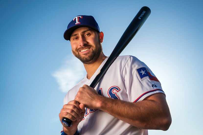 Texas Rangers outfielder Joey Gallo poses for a photograph during spring training photo day...