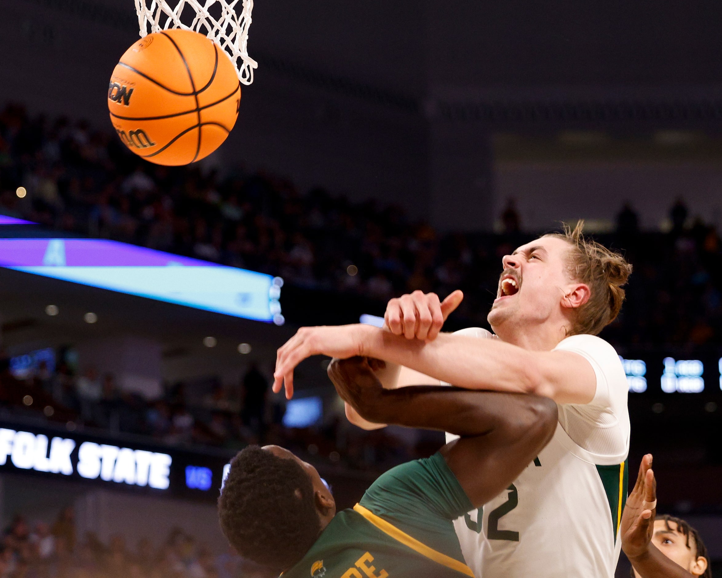 Norfolk State Spartans guard Yoro Sidibe (35) and Baylor Bears forward Zach Loveday (32)...