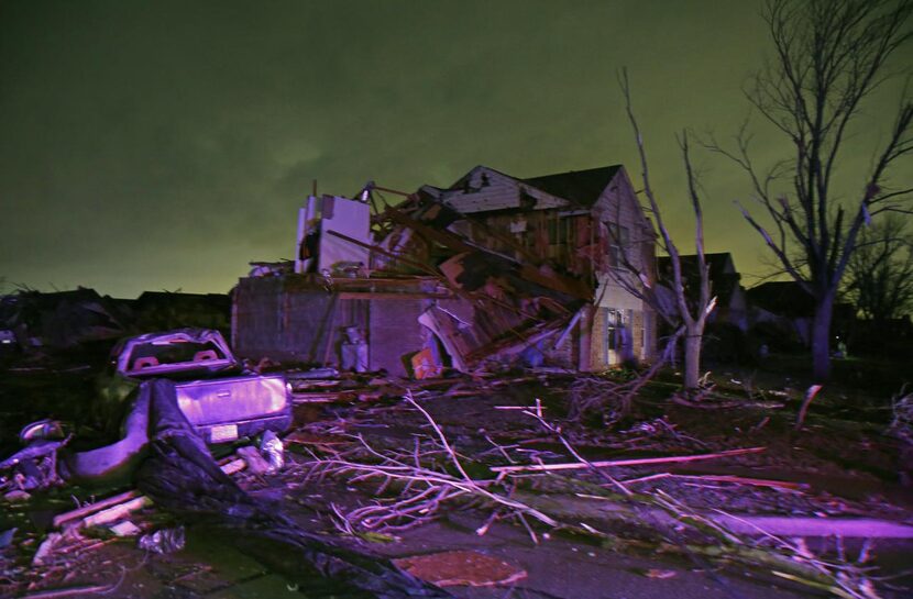 A home at the corner of Delta and Atlantic drives was heavily damaged by a tornado in...