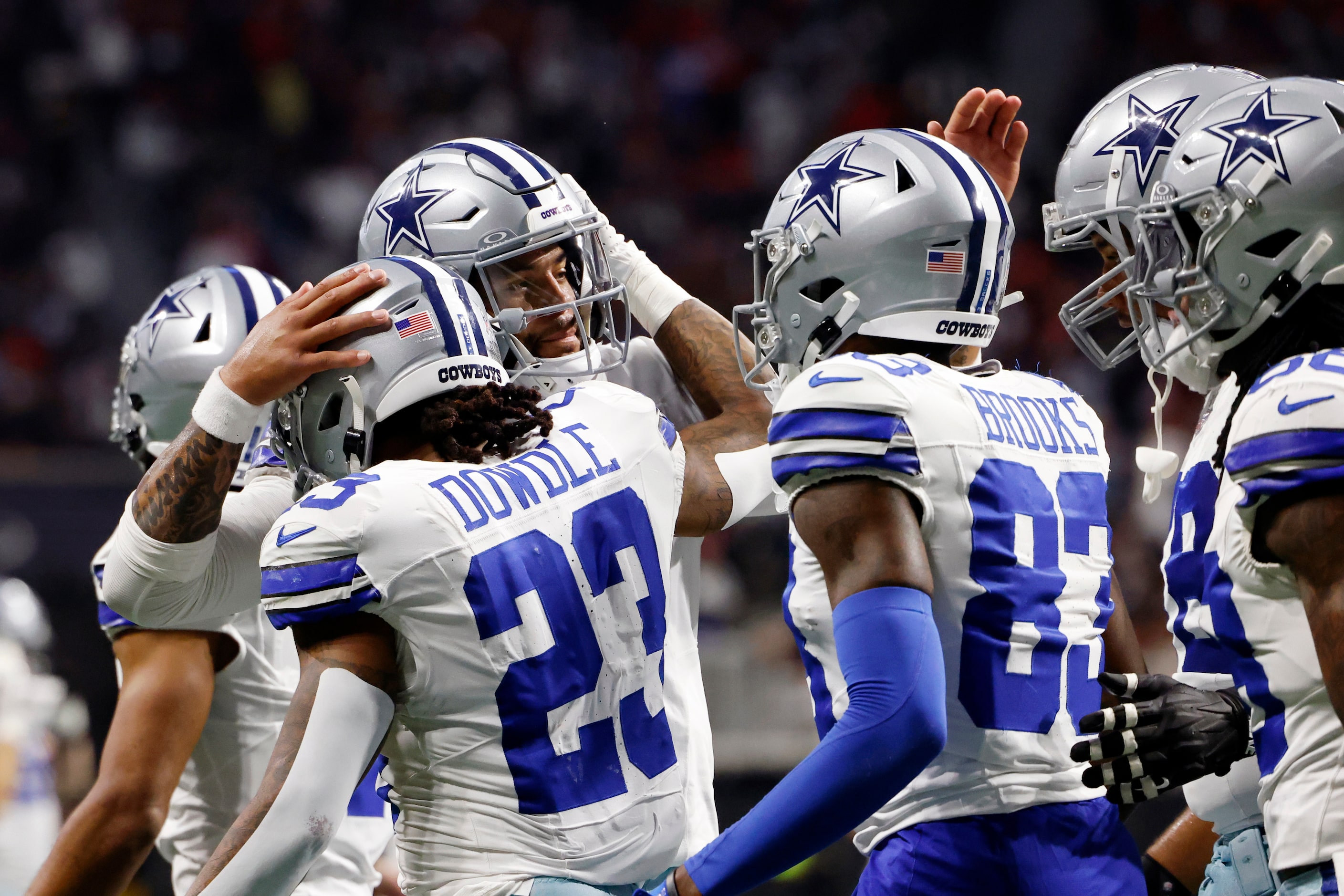 Dallas Cowboys quarterback Dak Prescott (4) celebrates his touchdown pass to running back...