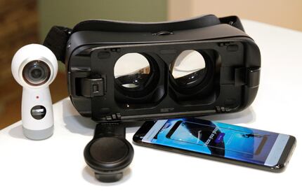 Samsung's smartphone snaps into its VR headset. The company also sells a camera that films...