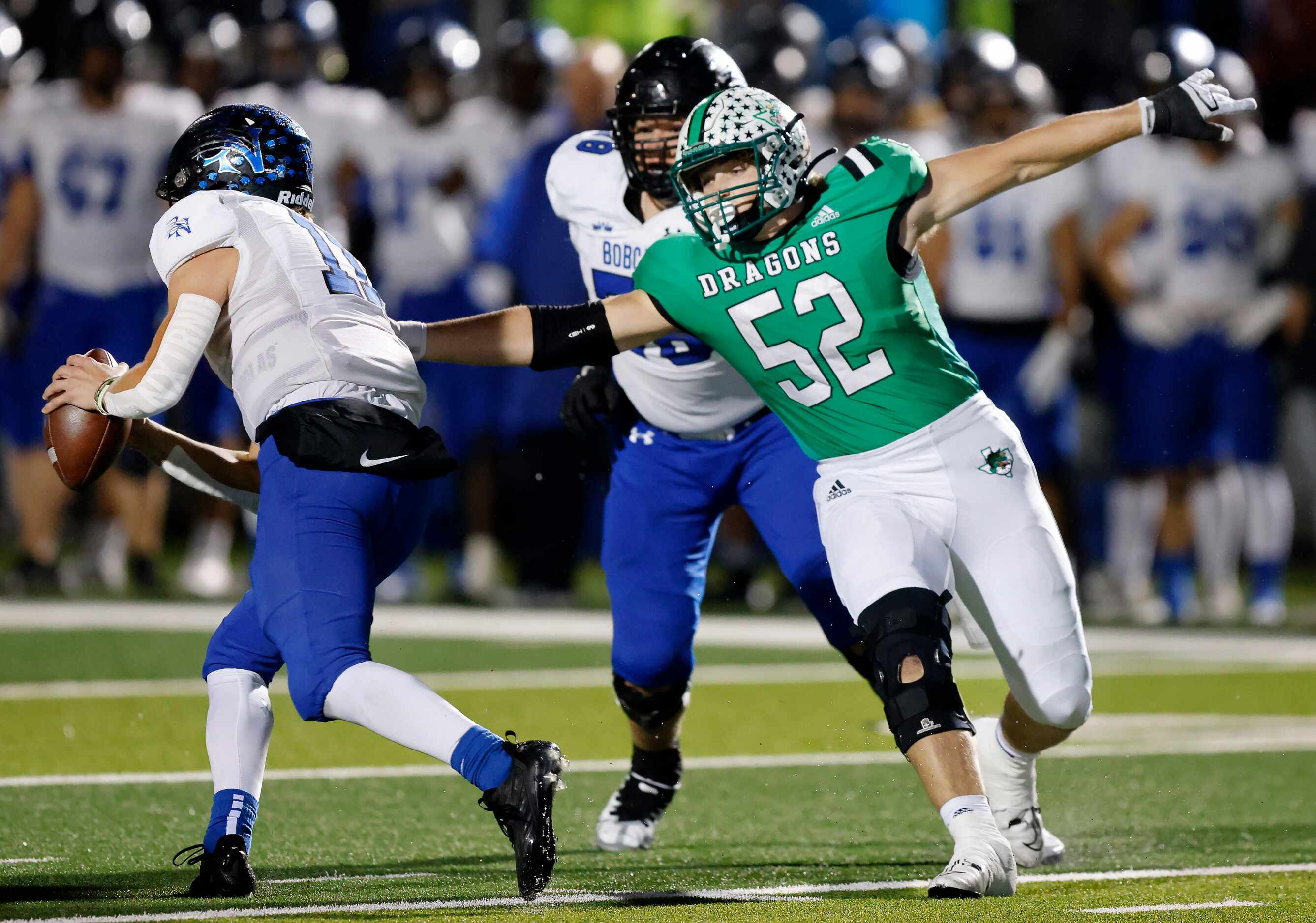 Southlake Carroll defender Cade Parks (52) attemots an arm tackle of Byron Nelson...