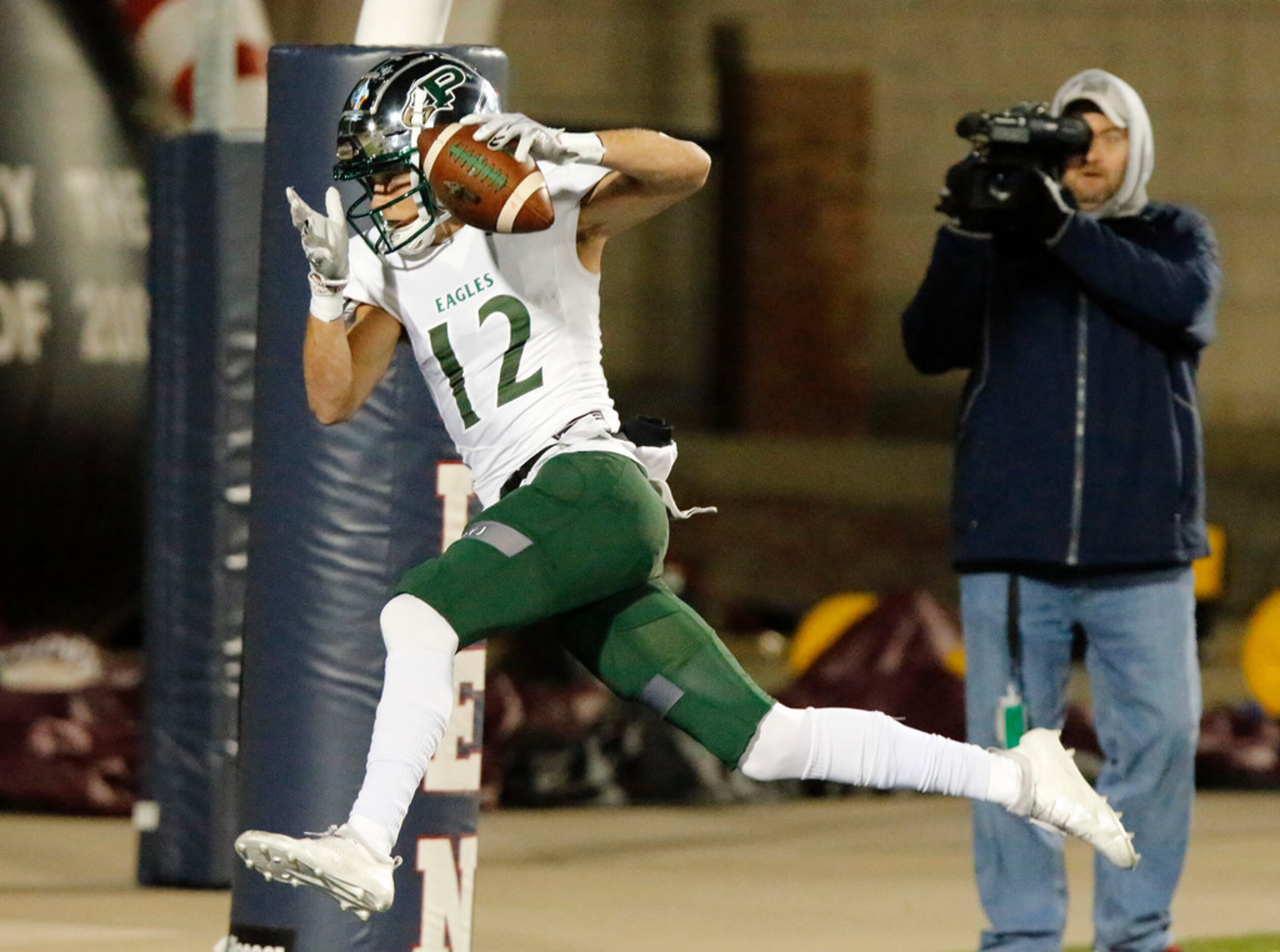 Prosper High School wide receiver Hayden Metcalf (12) catches the games first touchdown...