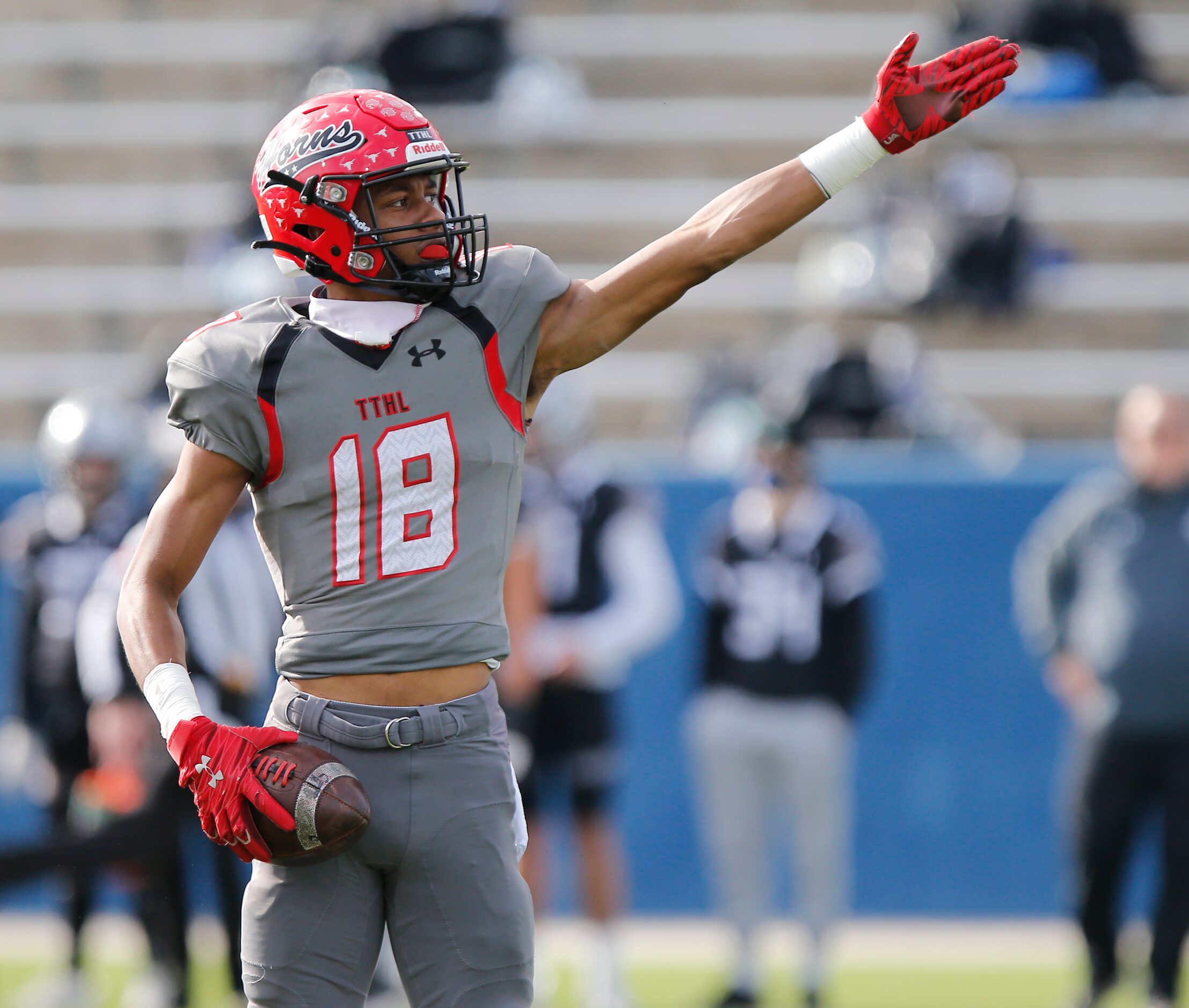 Cedar Hill High School wide receiver Jayden Moore (18) signals first down after a catch to...