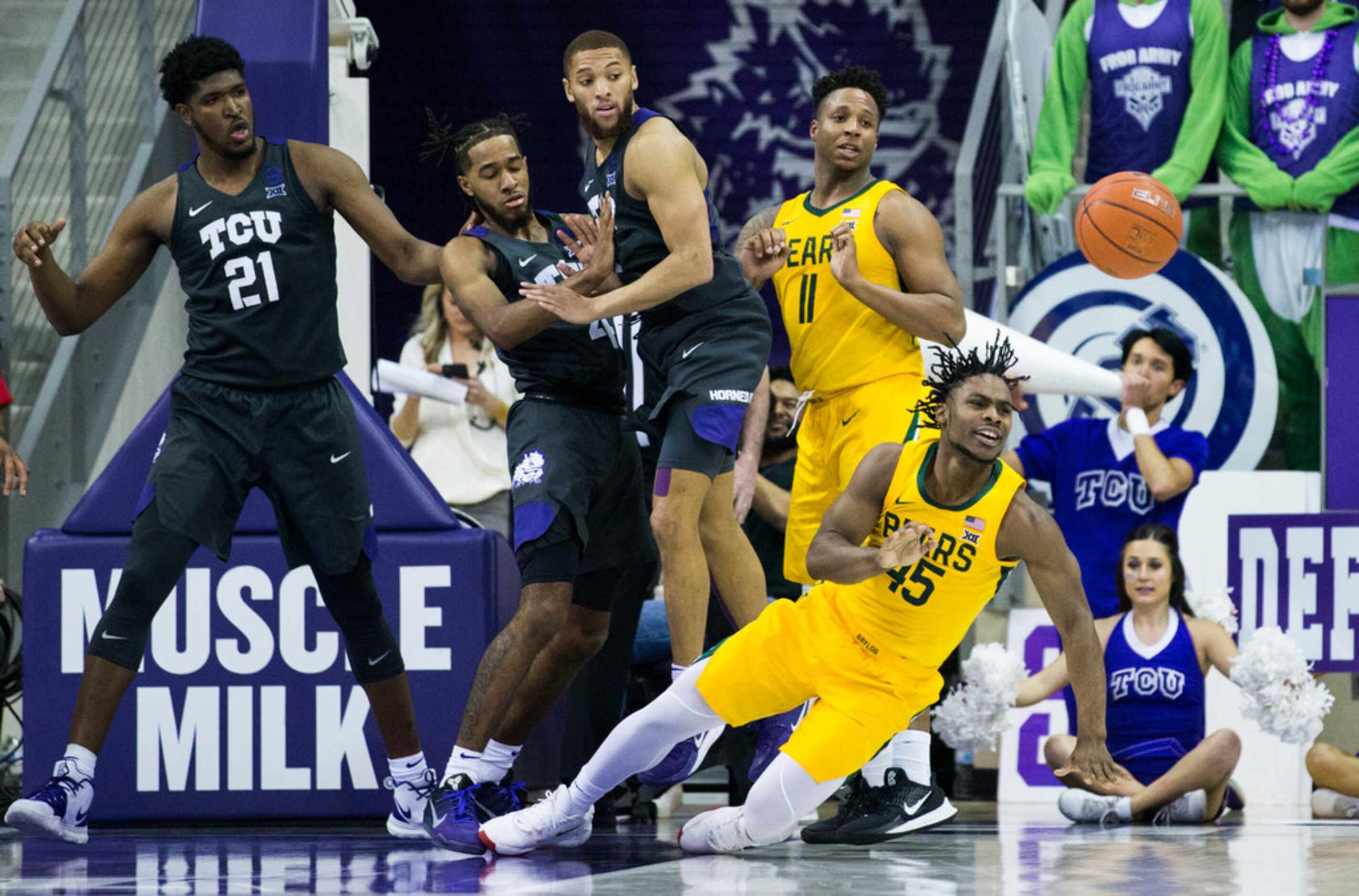 Baylor Bears guard Davion Mitchell (45) loses control of the ball during the second half of...