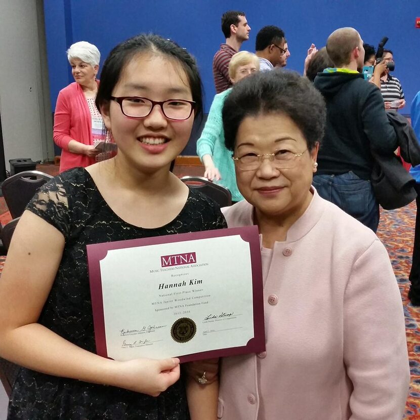 
Left, Hannah Kim of Plano, with her flute teacher, Monica Song. 
