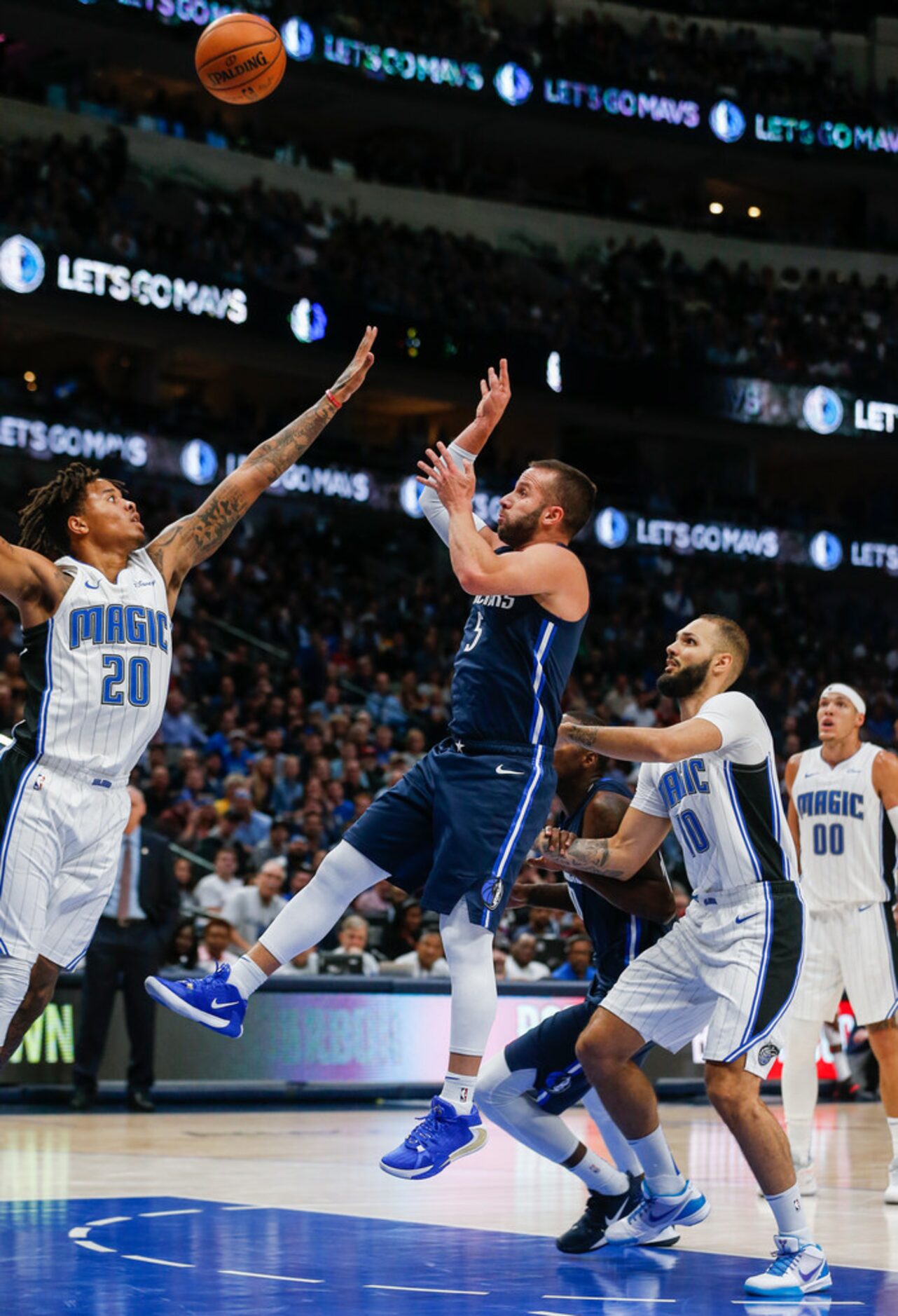 Dallas Mavericks guard J.J. Barea (5) puts up a shot over Orlando Magic guard Markelle Fultz...