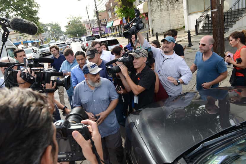 The father of Ahmed Rahami, Mohammad Rahami,  came out of his home through a crowd of media...