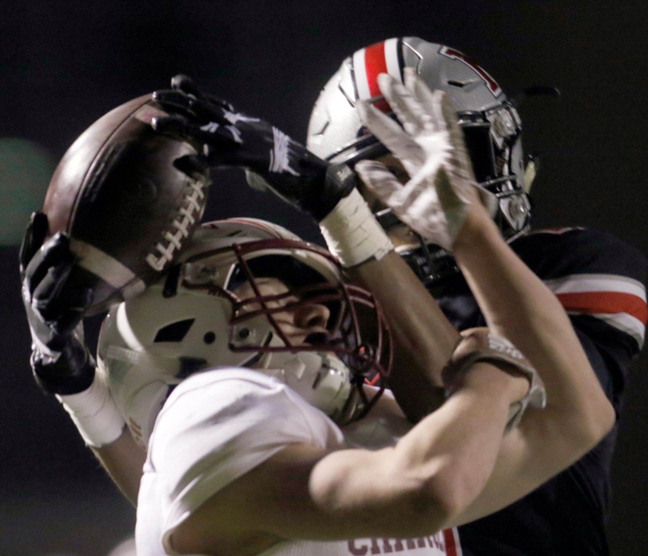 Flower Mound Marcus receiver Dallas Dudley (11) shows great focus and determination as he...