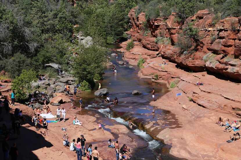 Just outside of Sedona, Ariz., is Slide Rock State Park, named for the smooth rocks of the...