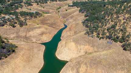 Aerial photos of the West Branch Feather River near Lime Saddle Marina show a shrinking...