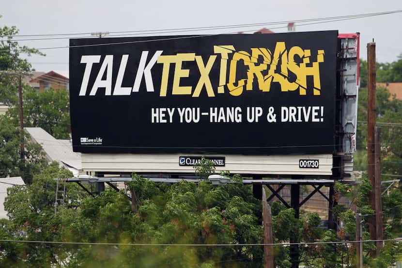  An anti-texting billboard reminds Texas drivers to do the right thing. (DMN photo)