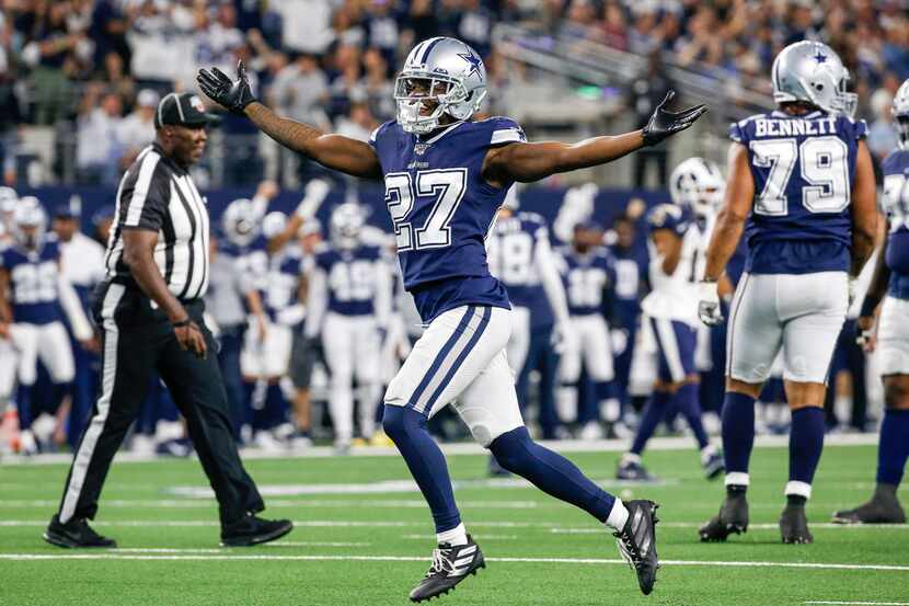 Dallas Cowboys cornerback Jourdan Lewis (27) celebrates a sack of Los Angeles Rams...