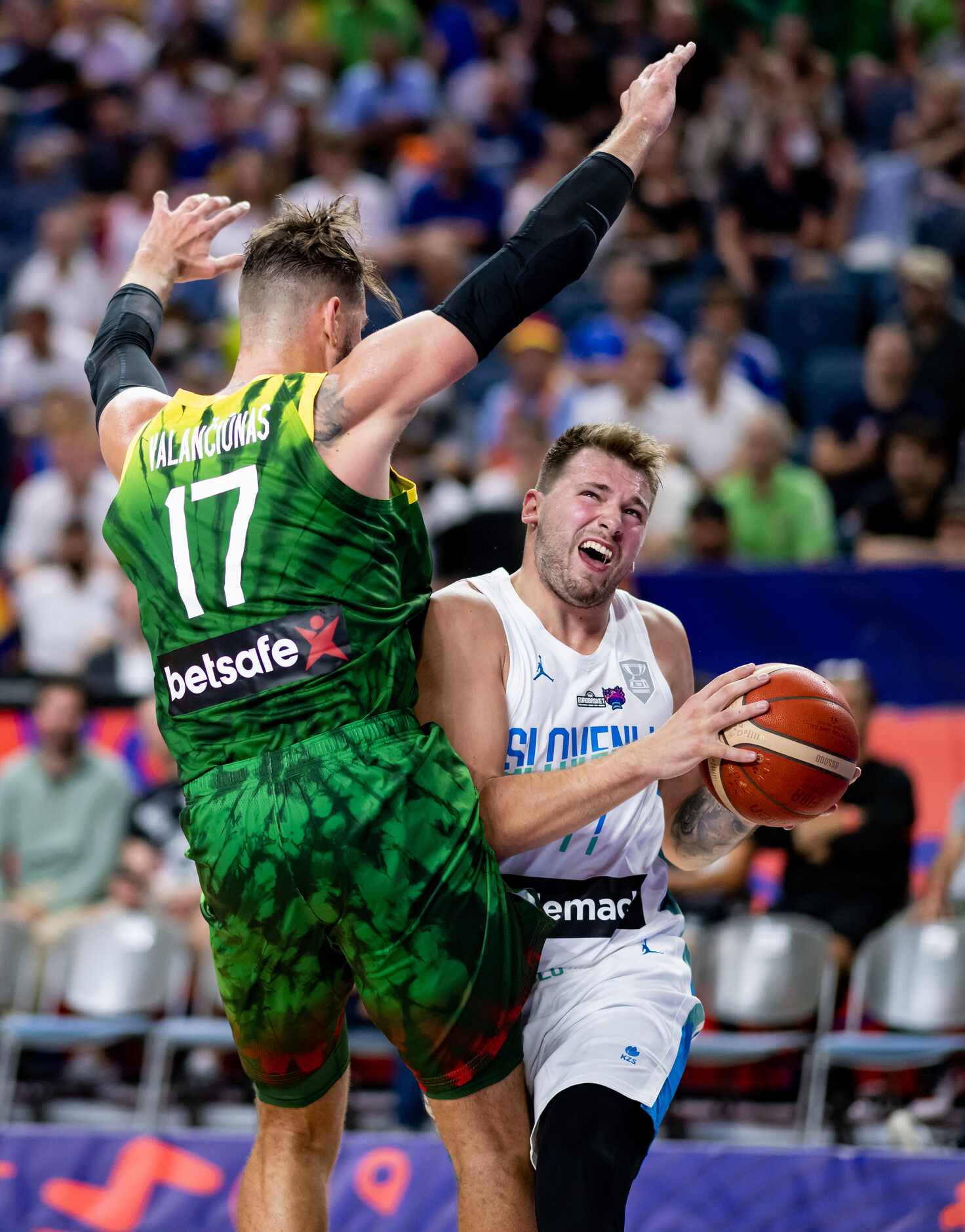 COLOGNE, GERMANY - SEPTEMBER 01: Luka Doncic of Slovenia in action against Jonas Valanciunas...