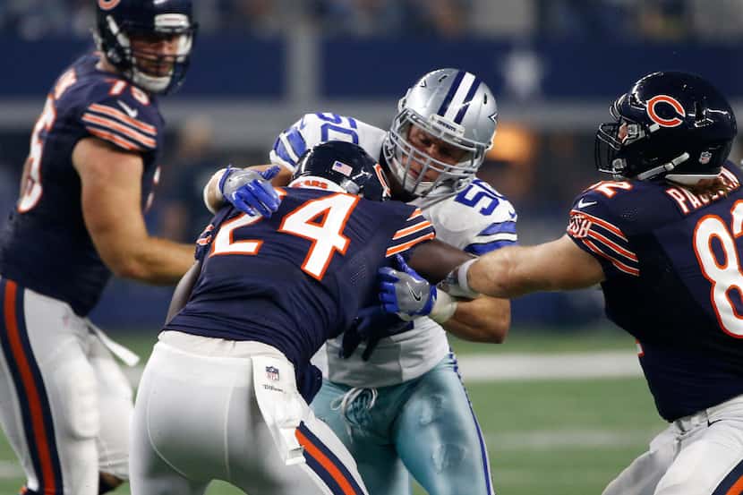 Chicago Bears running back Jordan Howard (24) is stopped by Dallas Cowboys' Sean Lee (50) in...