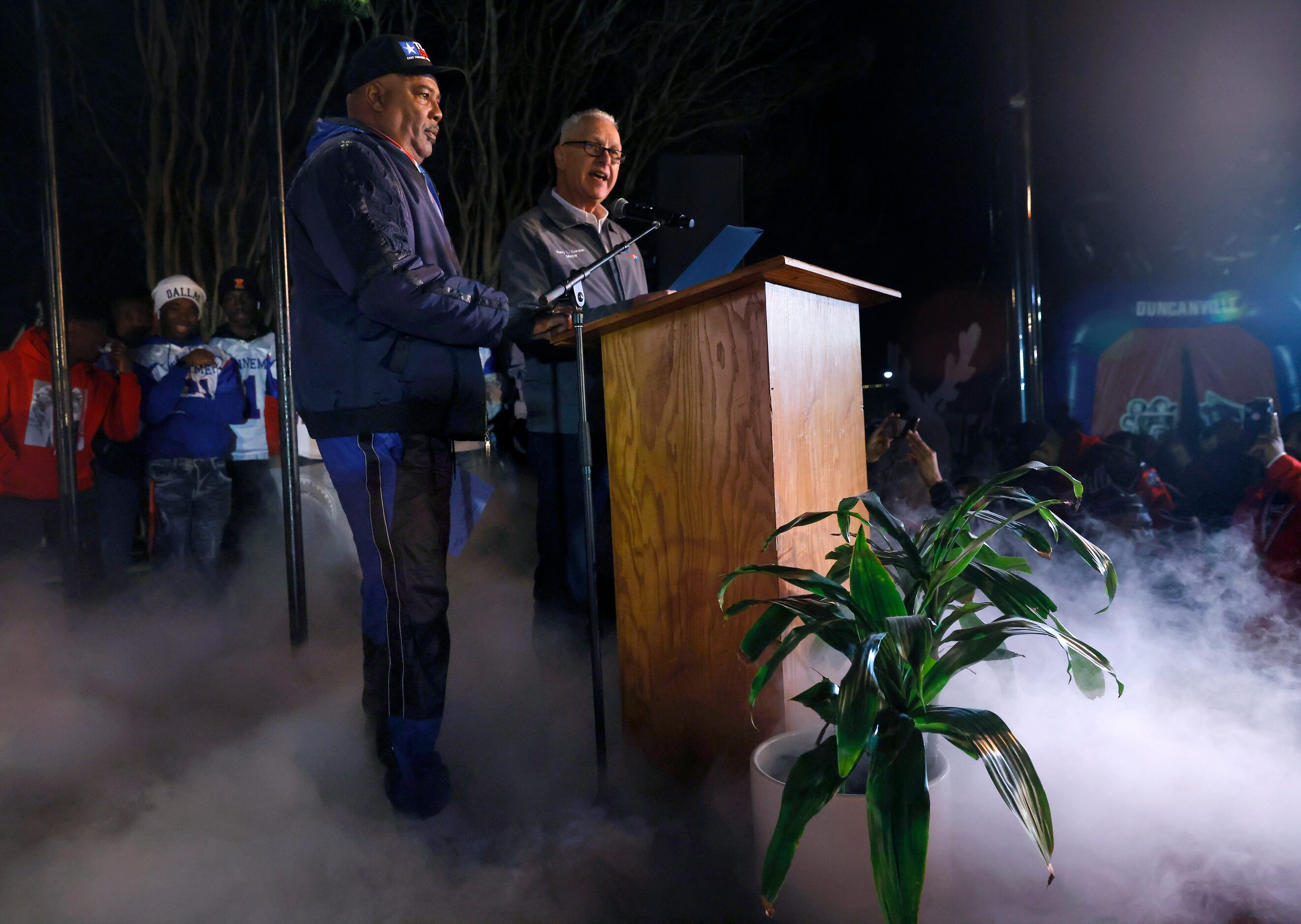 Duncanville Mayor Barry L. Gordon (right) reads a proclamation alongside Duncanville High...