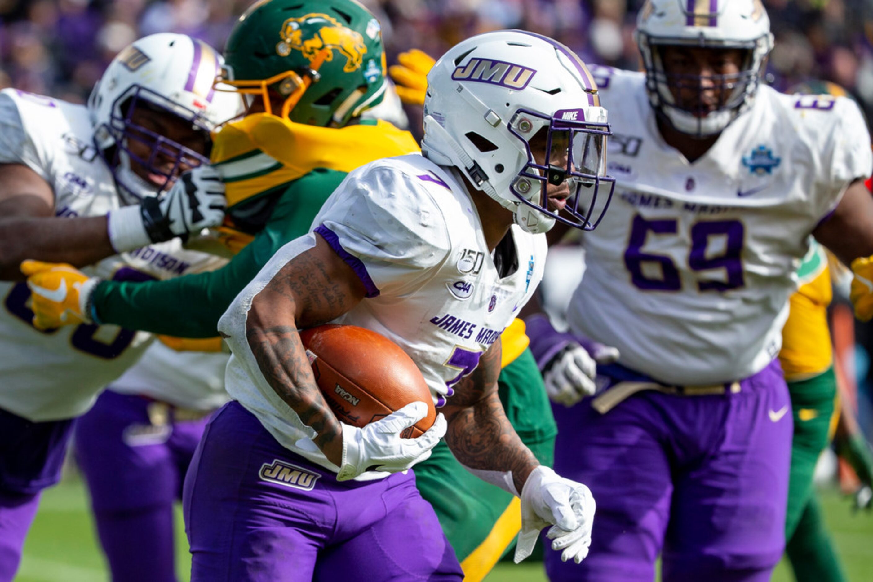 James Madison running back Jawon Hamilton (7) runs with the ball during the second half of...