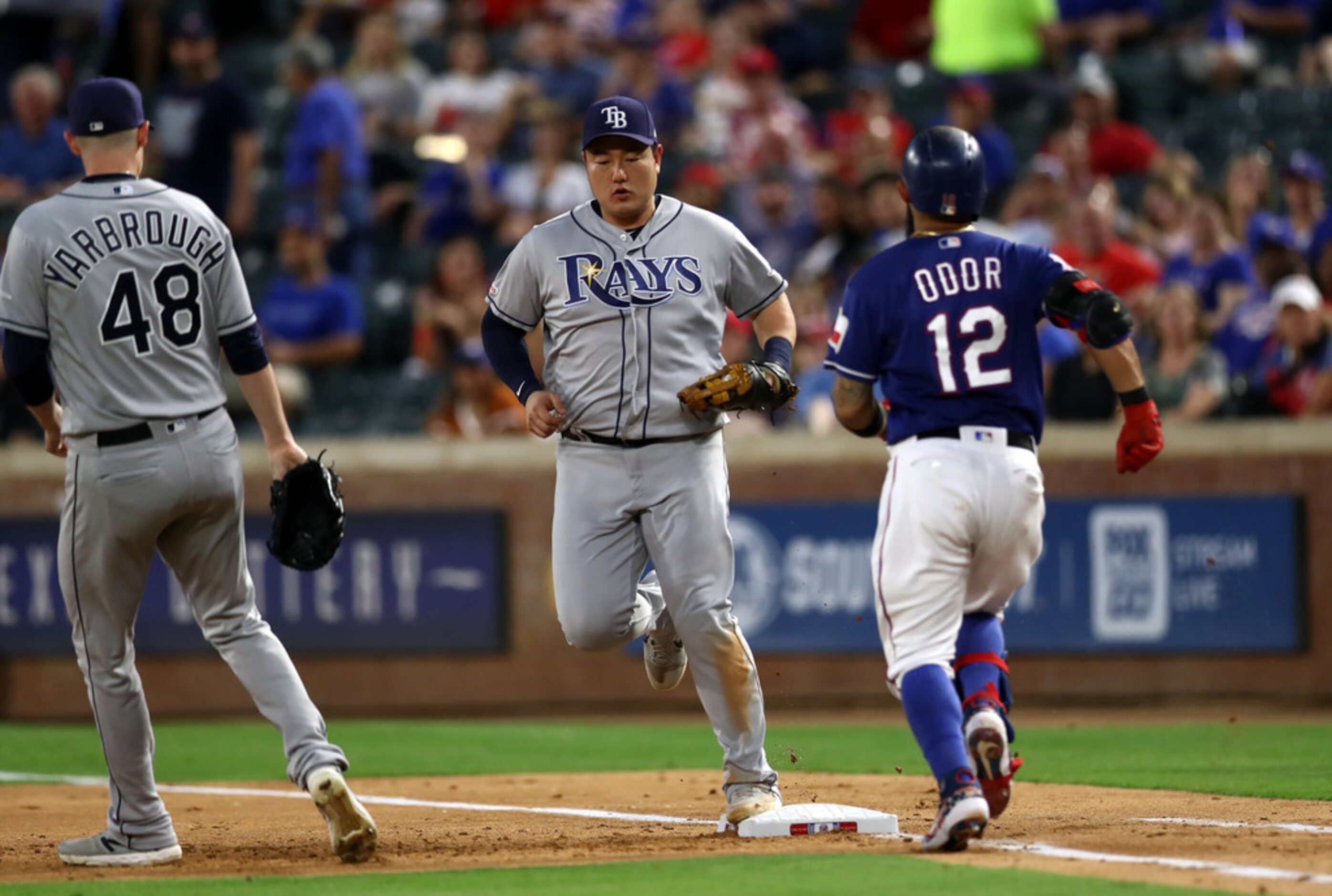 ARLINGTON, TEXAS - SEPTEMBER 10:  Ji-Man Choi #26 of the Tampa Bay Rays makes the out...