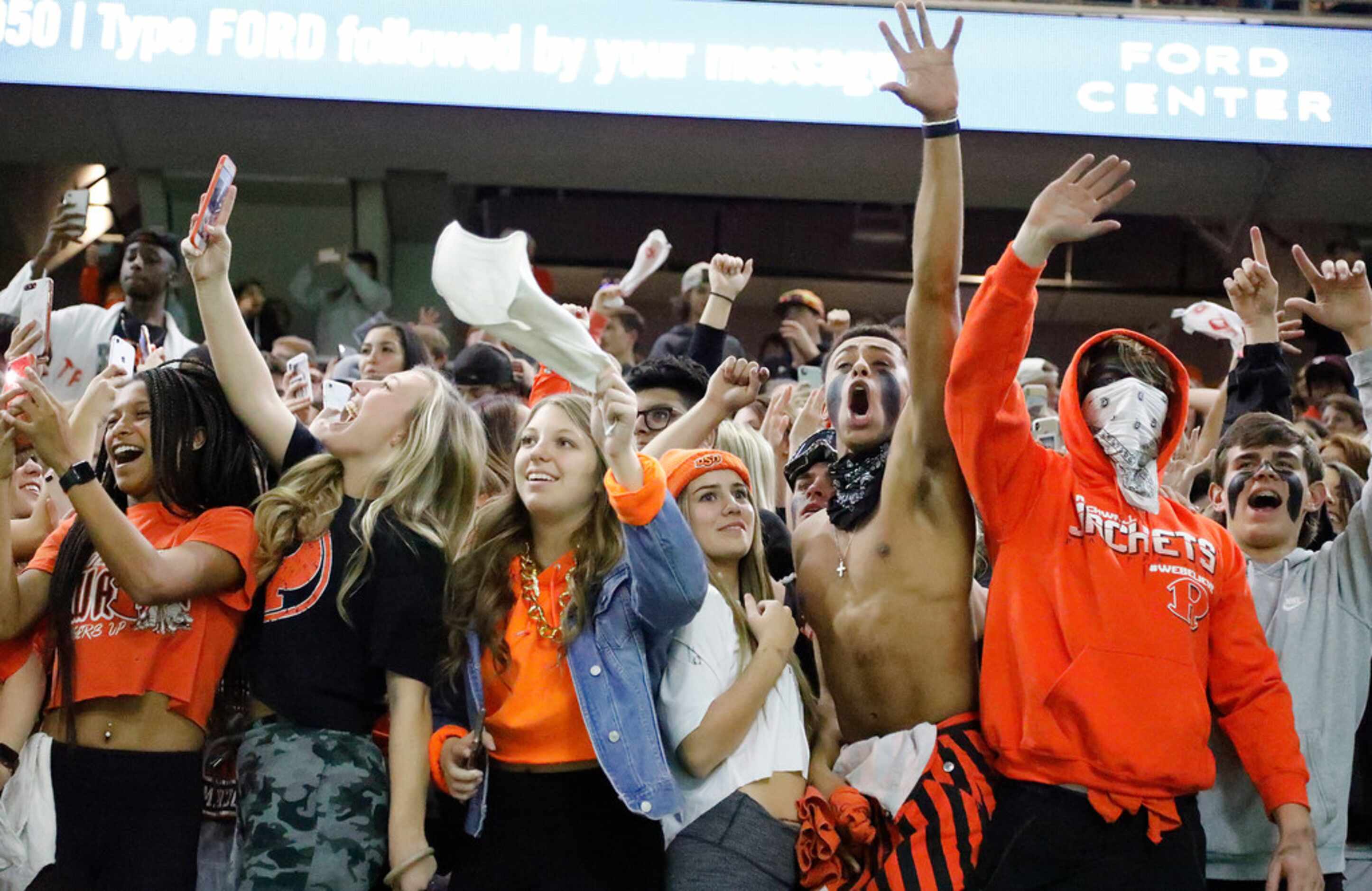 Rockwall High School students react as time runs out with a victory as Prosper High School...