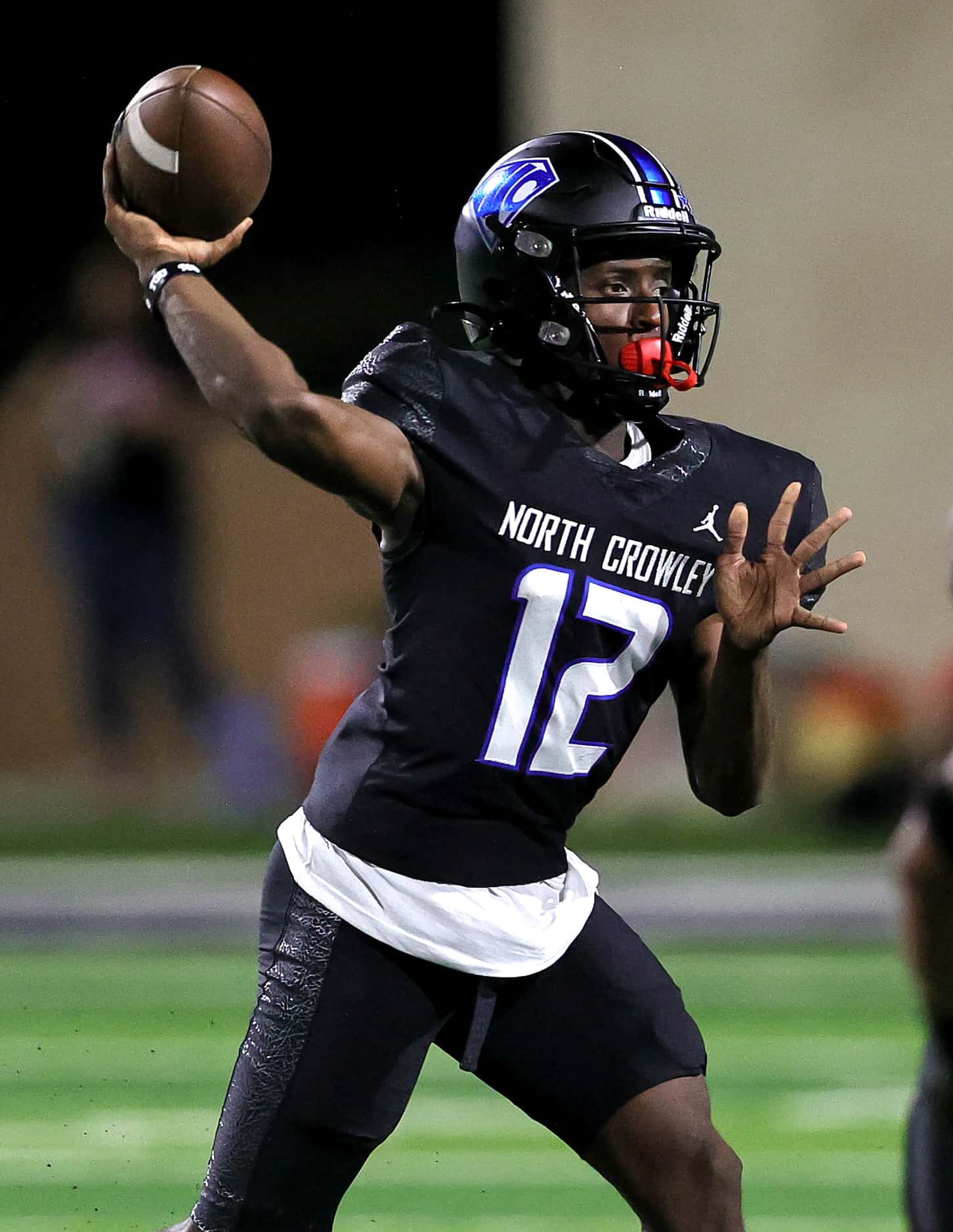 North Crowley quarterback Chris Jimerson Jr. attempts a pass against Euless Trinity during...