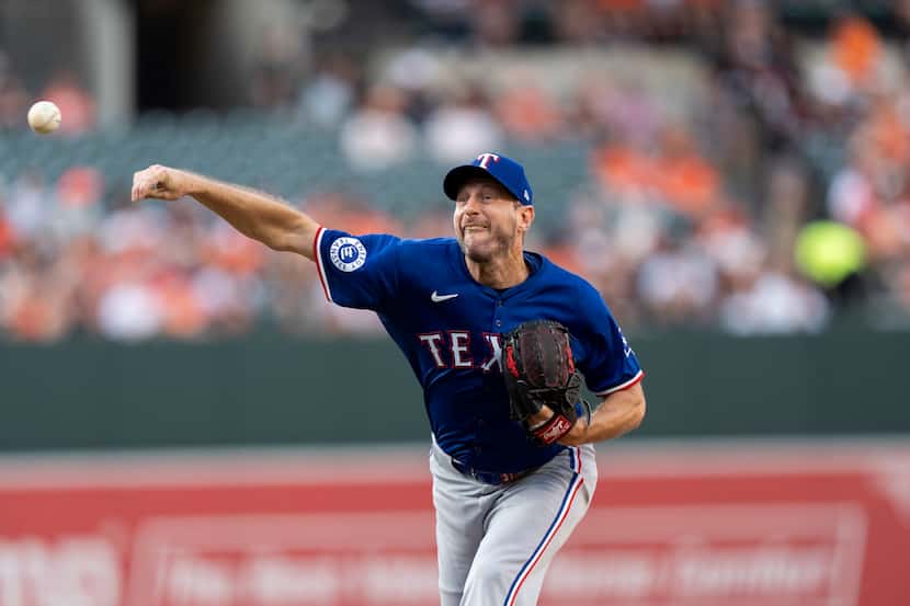 Texas Rangers starting pitcher Max Scherzer delivered during the first inning of a baseball...
