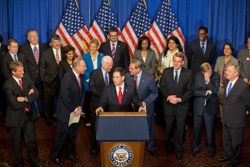  Members of the so-called Gang of Eight unveiled details of their immigration bill in...