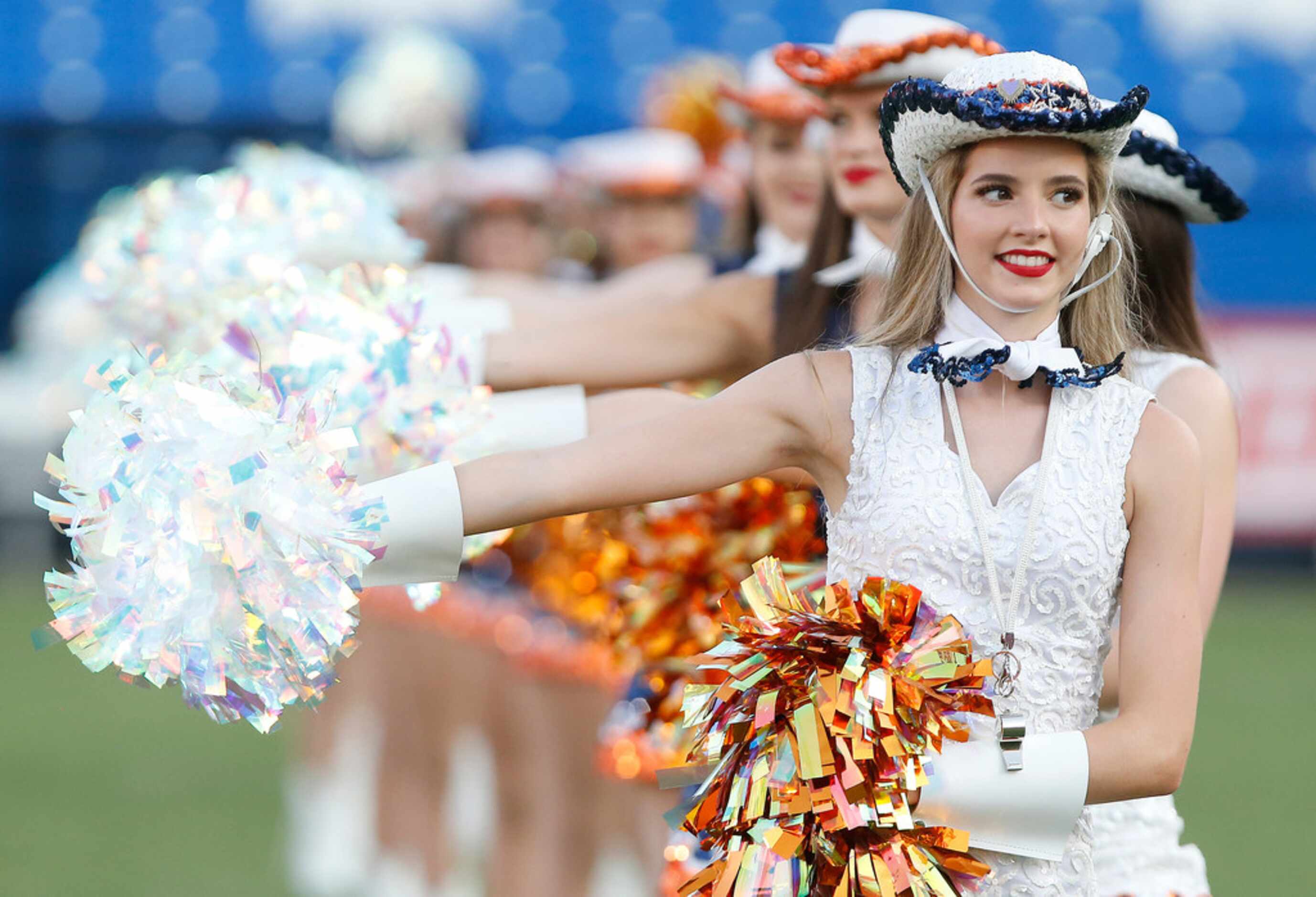 Lainey Watson, captain with the Legacy Line drill team for Wakeland High School, performs...