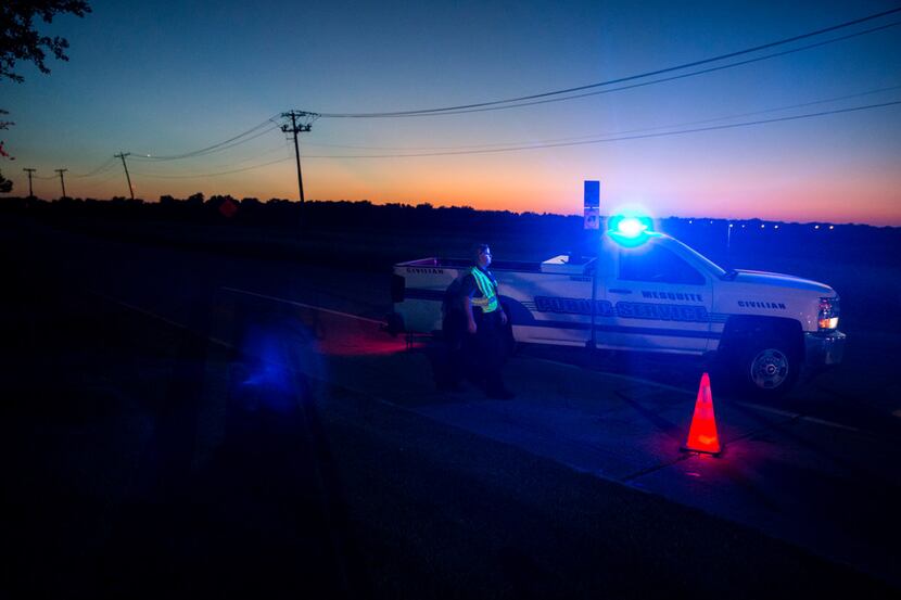 Officials block roads where one student died when a Mesquite Independent School District bus...
