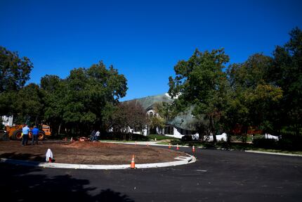 Without the 75-foot-tall, 75-foot-wide pecan at Armstrong Parkway and Preston Road, houses...